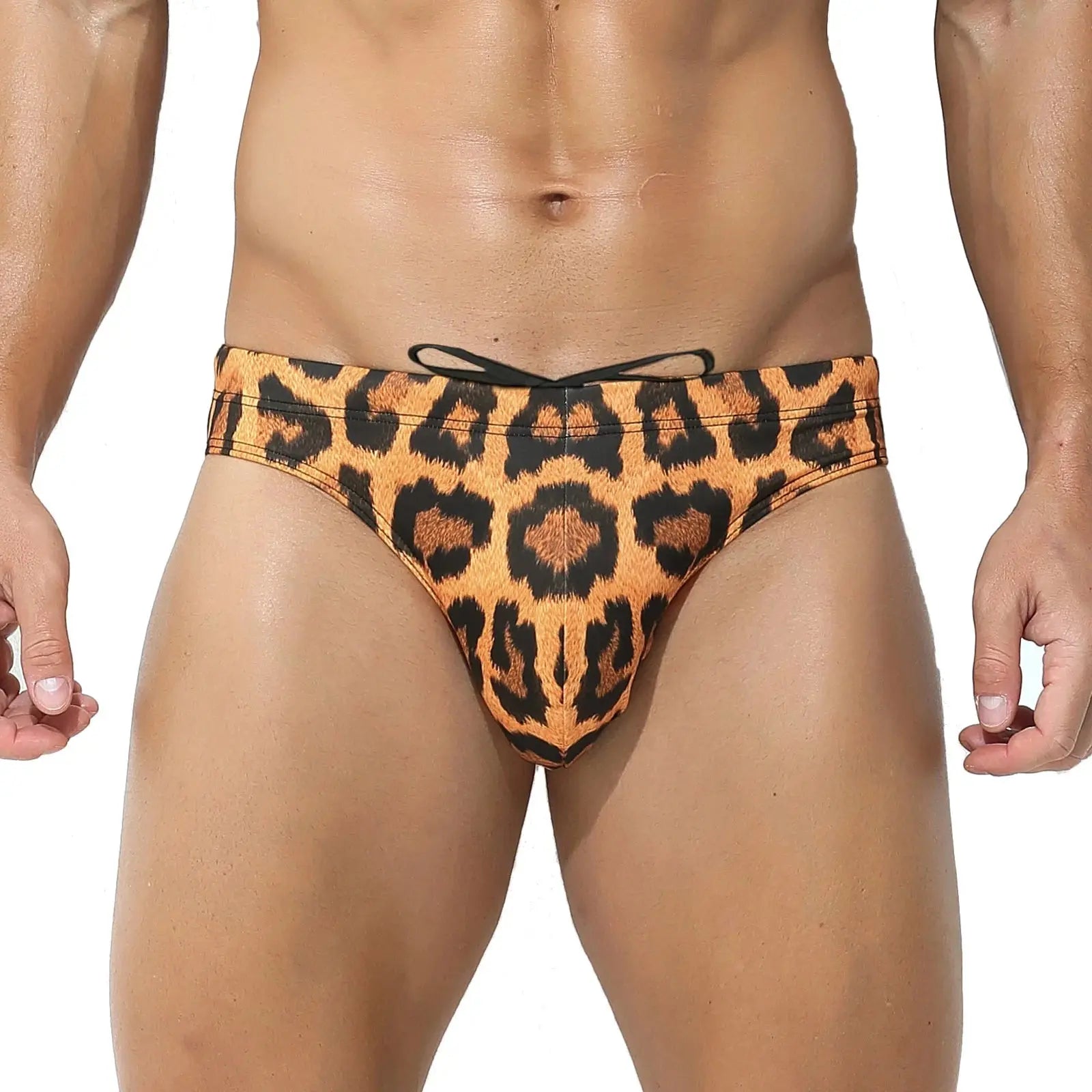 Slip de bain homme Jungle Line en tissu léopard rose, maillot de bain sexy à taille basse pour plage et piscine.