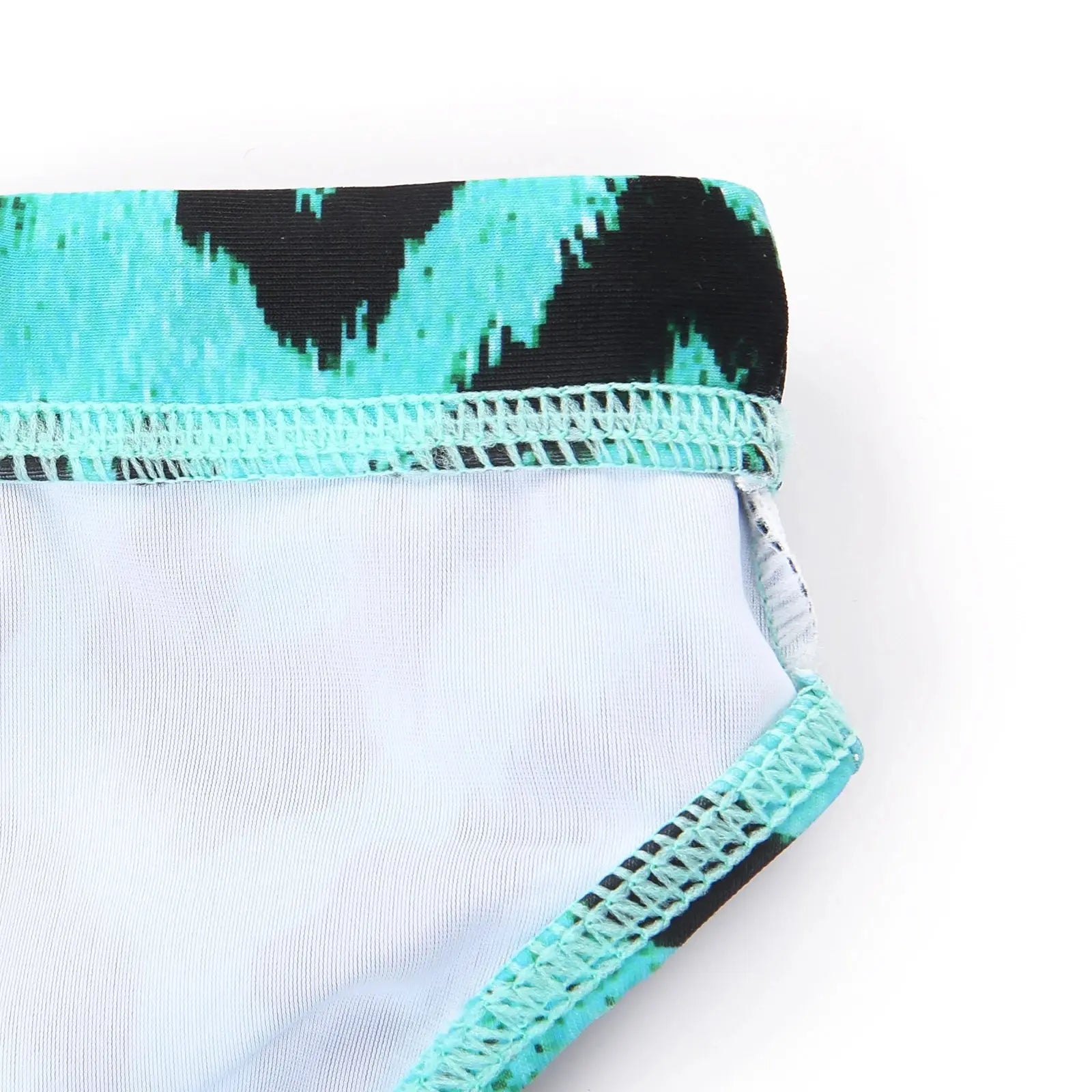 Shorty de bain pour homme Jungle Line en motif léopard, élastique, coupe basse, idéal pour plage, piscine et soleil.