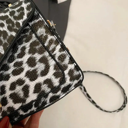 Sac à main en cuir léopard Jungle Line, petit sac carré à bandoulière, poignée courte, idéal pour femmes, style tote ou pochette.