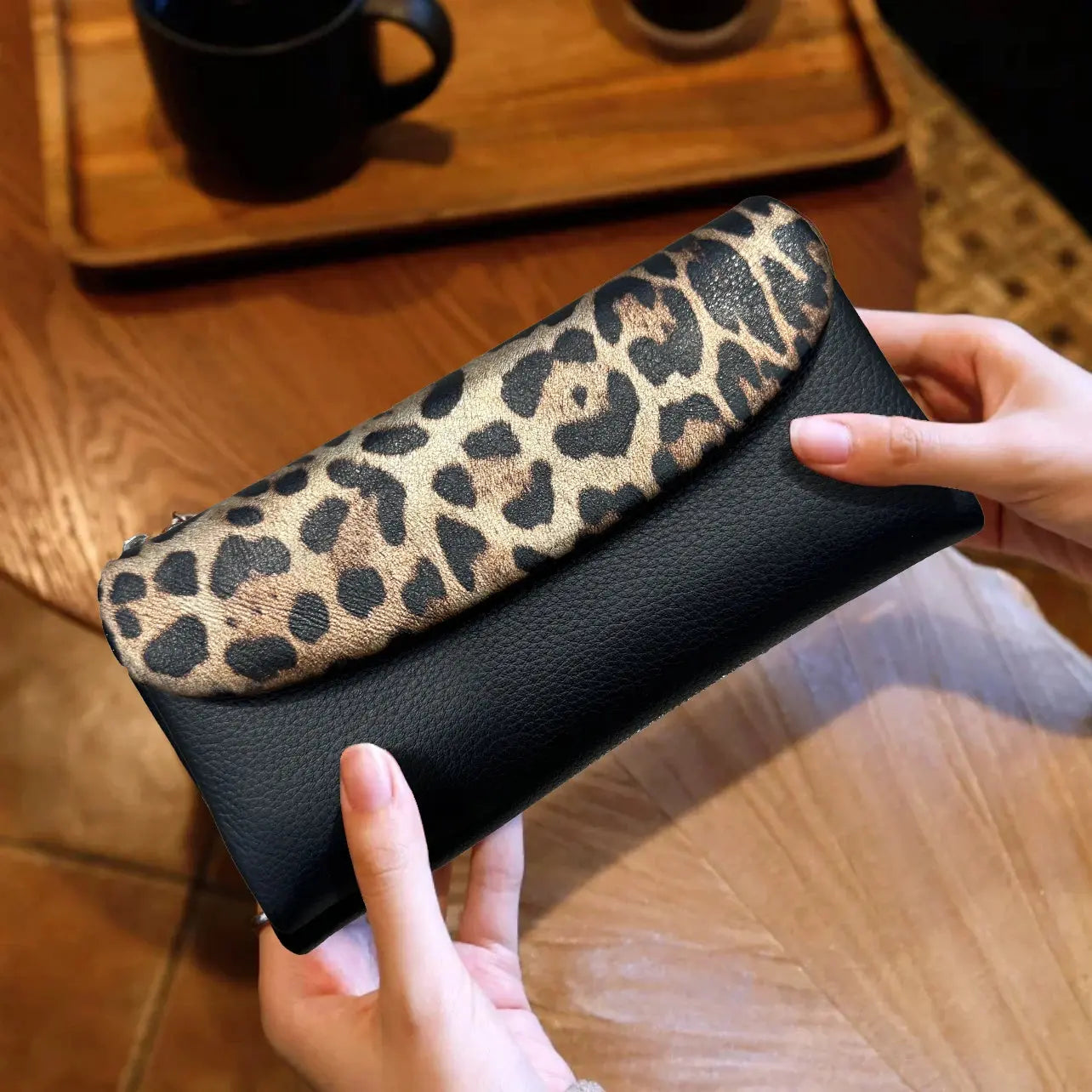 Red Leopard Pattern Women's Wallet by Jungle Line featuring a long design and coin pocket, perfect for stylish organization.