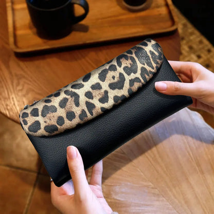 Red Leopard Pattern Women's Wallet by Jungle Line featuring a long design and coin pocket, perfect for stylish organization.
