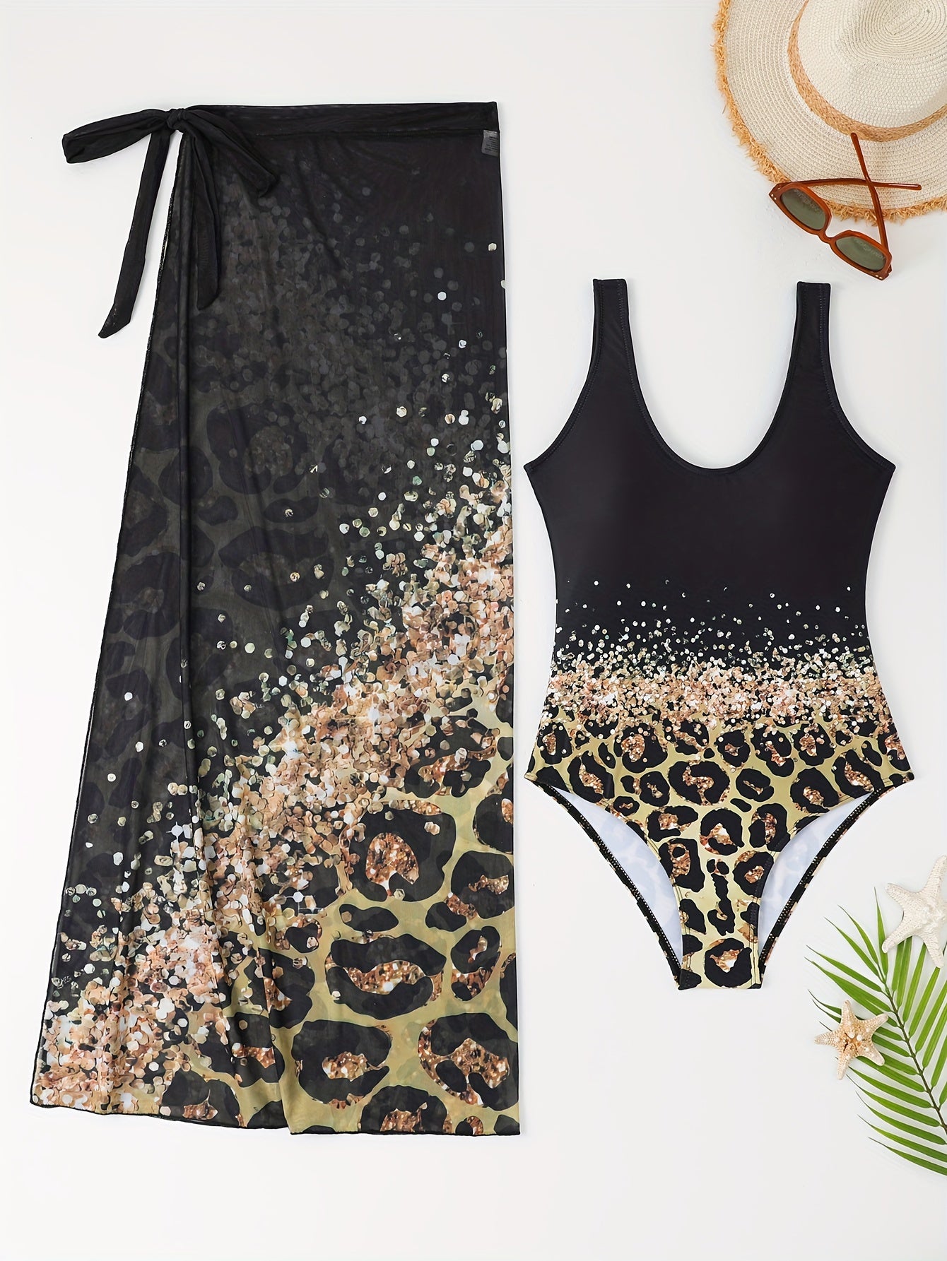 Maillot une pièce Jungle Line vert lac et jupe wrap léopard, imprimés exclusifs, pour un look élégant et tendance.