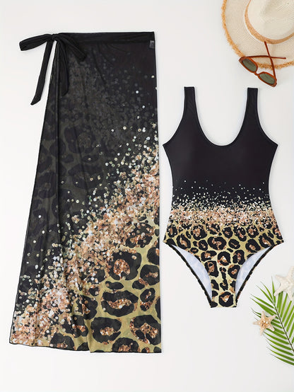 Maillot une pièce Jungle Line vert lac et jupe wrap léopard, imprimés exclusifs, pour un look élégant et tendance.