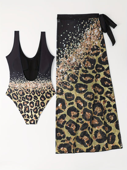 Maillot une pièce Jungle Line à imprimé léopard vert lac, avec jupe pareo assortie, pour un look élégant et tendance.