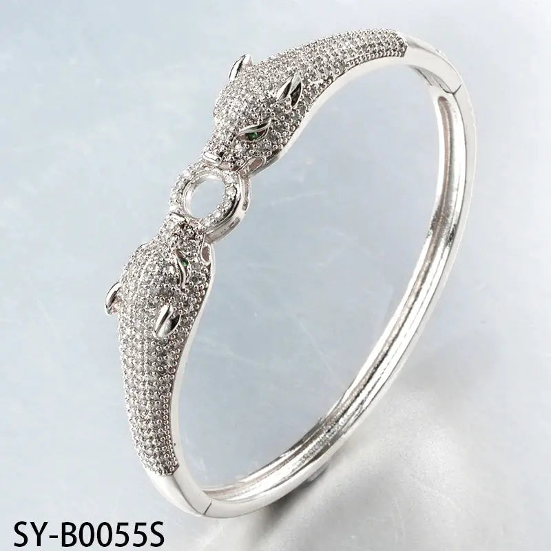 Bracelet pour femmes Jungle Line avec tête de léopard en or et argent, design coloré et élégant, bijoux tendance.