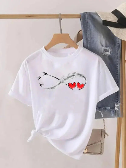 White women's graphic T-shirt by Jungle Line featuring a love heart and feather print, short sleeves, casual fashion top.