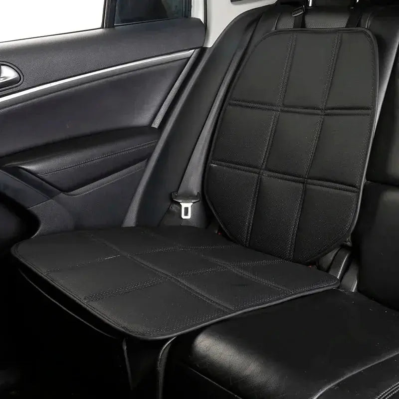 Leather car seat protector cover by Jungle Line designed for child safety, fits rear seats, protects against spills and damage.