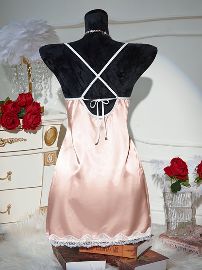 Nuit de femme Jungle Line en satin à motif léopard, décolleté en V, sans manches, ourlet asymétrique et poignets plissés.