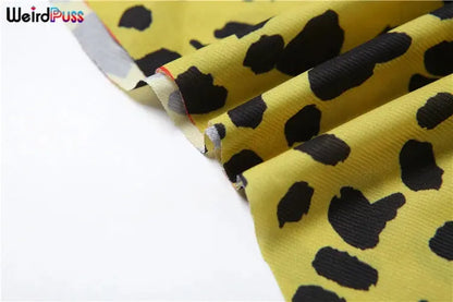 Jungle Line yellow leopard-print halter dress for women, backless chiffon bodycon with irregular hem and patchwork design.